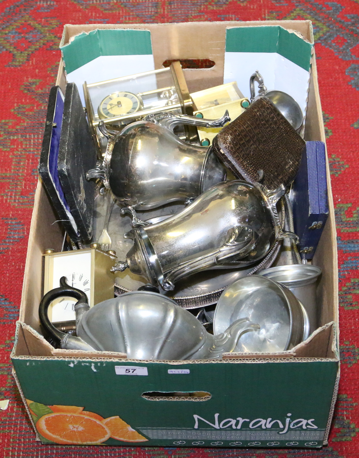 A box of various metalware to include Sheffield pewter examples and cased cutlery, etc.