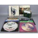A collection of L.P and single records to include rock, pop and easy listening.