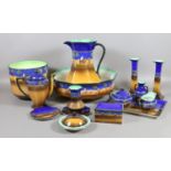 Fourteen pieces of Tunstall ceramics decorated with desert and Arab scenes to include jug and bowl,