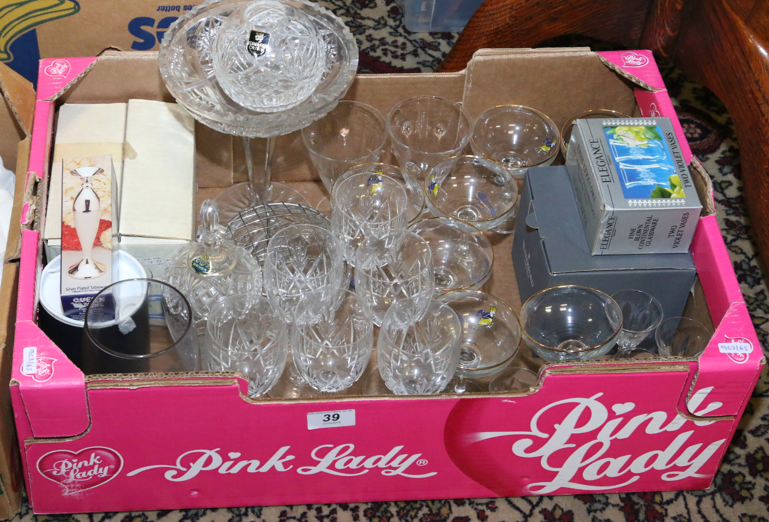 A collection of assorted glassware to include Edinburgh and Waterford crystal examples,