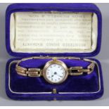 A ladies 9 carat gold cased manual bracelet wristwatch by Thos Russell & Son, Liverpool.