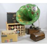 A oak cased Thomas Edison cylinder phonograph with painted and decorated horn and support bar in