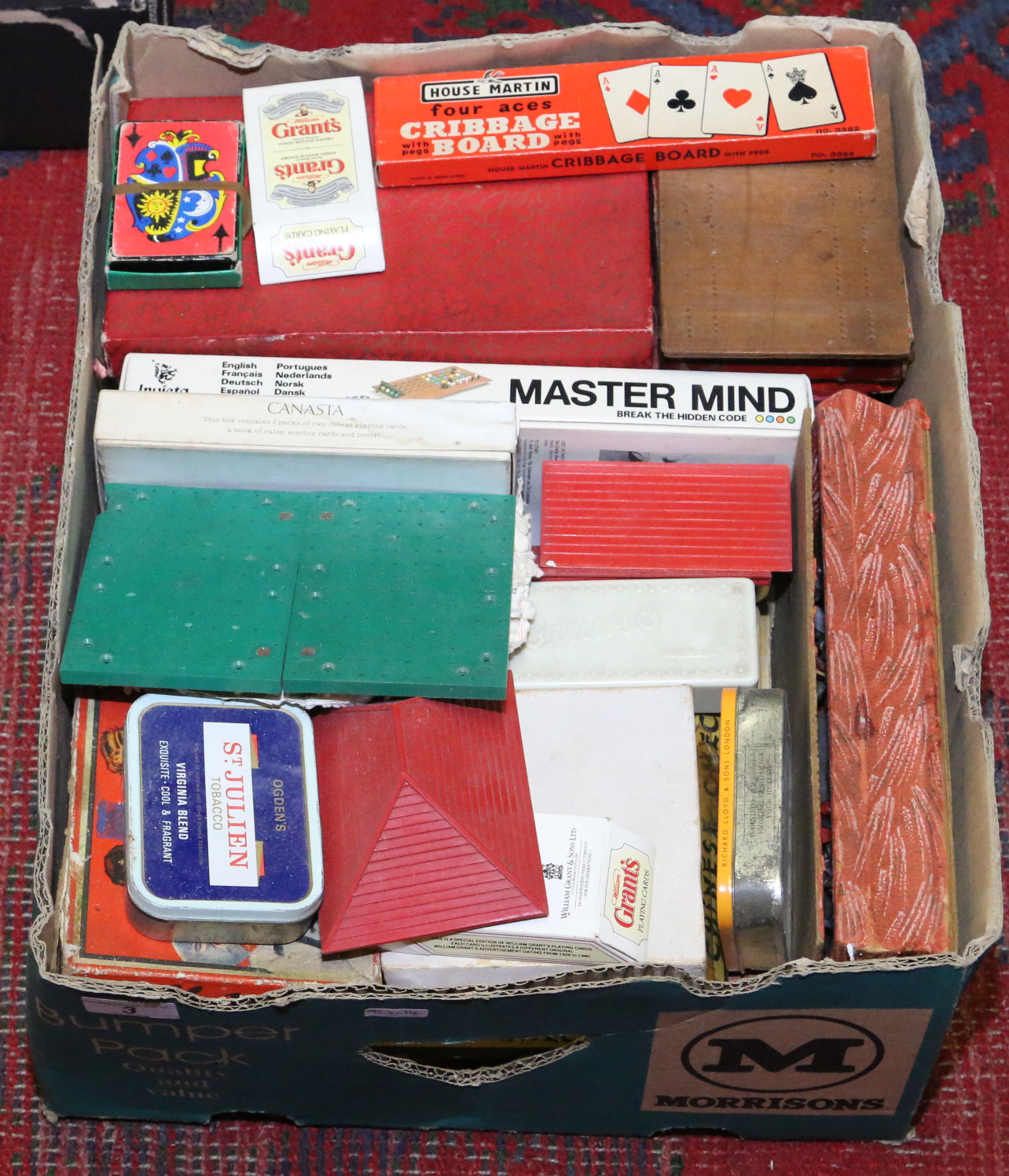 A collection of childrens toys and games to include Mastermind and Canasta, etc.