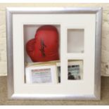 A Joe Frazier signed Everlast boxing glove with certificate of authenticity and photograph of