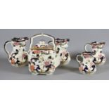 Four Masons Mandalay graduated jugs along with a matching teapot and cover.