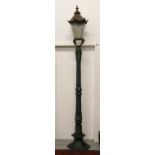 A painted cast iron lamp post.