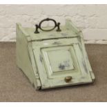 A painted coal scuttle.