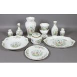 Ten items of Aynsley ceramics decorated in the wild Tudor design to include cabinet plates,