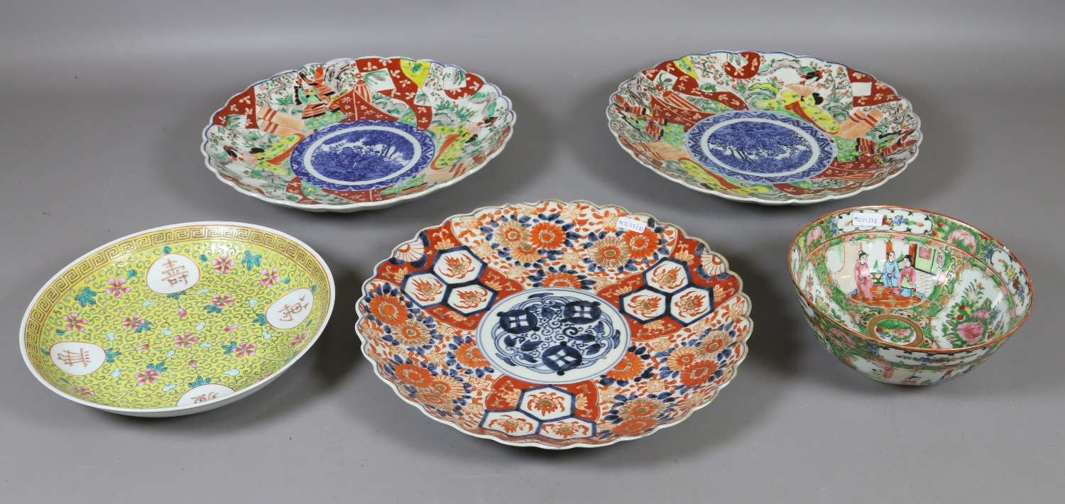 Three Japanese painted chargers along with two Chinese bowls.