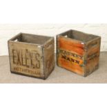 Two vintage wooden advertising crates with stencilled branding one for 'Watney Mann' the other