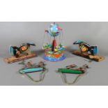 Five vintage clockwork tinplate toys, two pairs of woodpeckers,