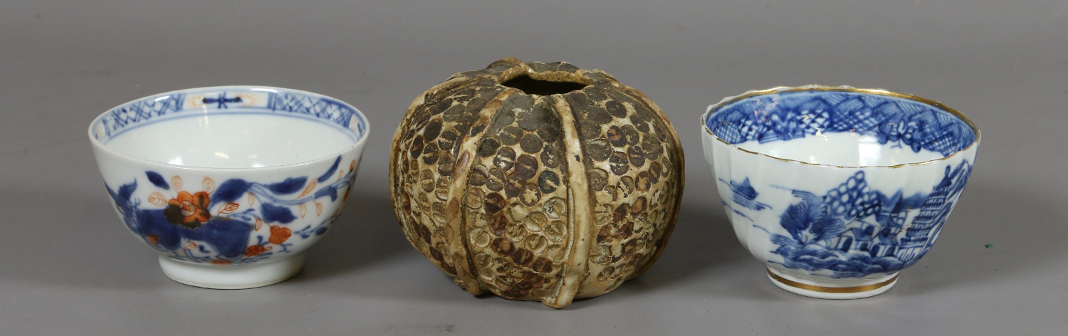 A Japanese art pottery bud vase in the form of a sea urchin,