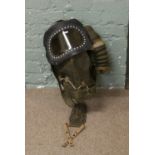 A World War II baby gas mask.