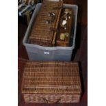 A leather attache/briefcase with fitted interior along with two wicker work baskets.