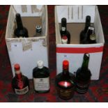 Two boxes of various unopened bottles of alcohol including Gordons gin, Harveys Bristol cream,