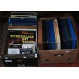 Two boxes containing a quantity of classical L.Ps, Readers Digest, antique interest, DVDs etc.