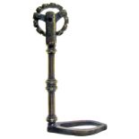 A rare brass pastry jigger, the wheel designed to produce beading, on turned stem with plain leaf-