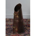 A copper coal scuttle, of tapering form, 58cm high sold with three copper handled fire irons. 60cm