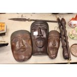 3 African carved masks (thought to be from Rhodesia), spears etc.