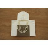 Triple strand pearl necklace with 585 gold clasp