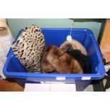 Box of fur hats, etc.