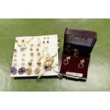 25 pairs of 9ct gold earrings