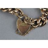 Bracelet with heart shaped padlock clasp, marked '9ct full' 16grams