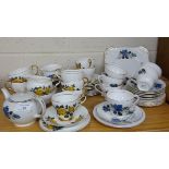 A Blue Rose and a Yellow Rose Tea Set