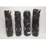 Set of Four Oriental Carved Hardwood Figures with Silver Inlays