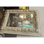 Victorian Heavily Decorated Gilt Picture Frame, later painted and mirror added 120cm x 85cm