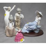 Four Nao Figures on Wooden Bases and a Small Coalport Figurine