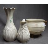 Three Pieces of Belleek China with Black Marks, a Jardiniere, Embossed Jug and Vase