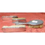 Four Hall Marked Silver Backed Hair Brushes