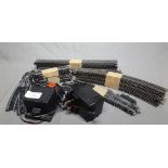 Large Quantity of "OO" Gauge Track and Transformers, Controllers etc