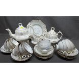 Early 19th Century Gilded Tea Set comprising of eleven cups & saucers, teapot, milk and sugar and