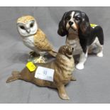 Three Beswick Figures an Unglazed Spaniel, a Seal and a Seated Owl