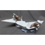 Two Lladro Figures one a Puppy Sitting in a Paper Aeroplane and one of a Puppy Sitting in a Paper