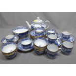 Early English Blue & White Tea Set with the Variation of Willow Pattern comprising of Teapot, Five