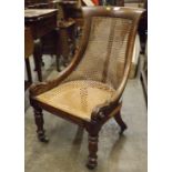 Small Regency Rosewood and Bergere Salon Chair, some damage to the cane