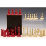 Red and white ivory chess set, 19th century, missing a white pawn, in the manner of Calvert, screw-