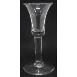 Wine glass, with bell shaped bowl, plain stem and flat foot, 15cm high     Condition report: Minor