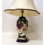 Moorcroft lamp with shade. Condition report: see terms and conditions