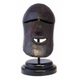 Songye helmet mask, 31cm high All lots in this Tribal and African Art Sale are sold subject to V.A.