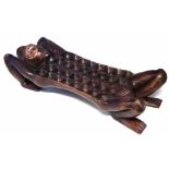 Figural Mancala board, 88cm long All lots in this Tribal and African Art Sale are sold subject to