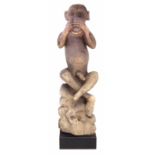 Carved figure of a Monkey covering his nose, 80cm high All lots in this Tribal and African Art