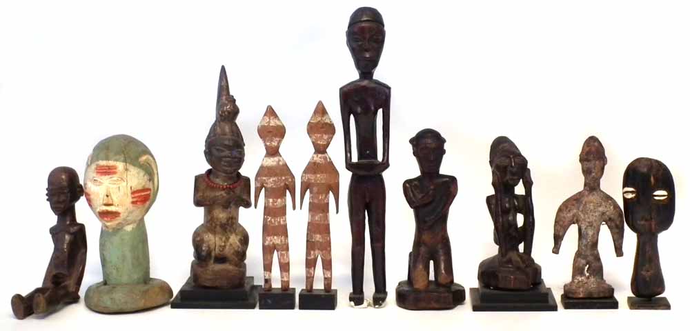 Ten African figures carved in various tribal styles, the largest measures 33cm high All lots in this