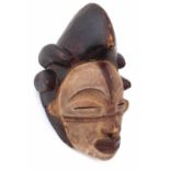 Punu mask, 28cm high All lots in this Tribal and African Art Sale are sold subject to V.A.T.