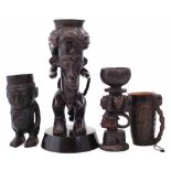 Kuba Anthropomorphic cup, together with three other similar cups, the tallest measures 36cm high All