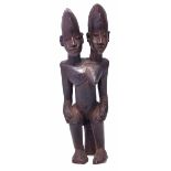 Lobi twins or double headed male female figure, 46cm high All lots in this Tribal and African Art