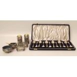 Cased set of twelve silver coffee spoons, two silver pepper pots, pair of silver salts and a pair of